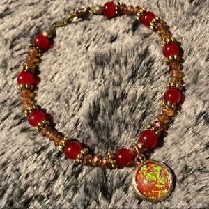 Mixed Orange Glass Bracelet w/ Opalescent Charm